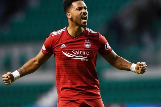 Shay Logan has extended his stay at Aberdeen