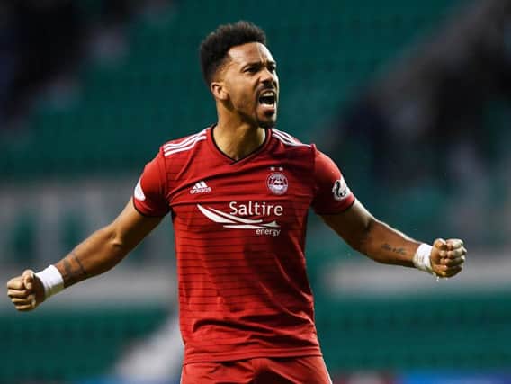 Shay Logan has extended his stay at Aberdeen
