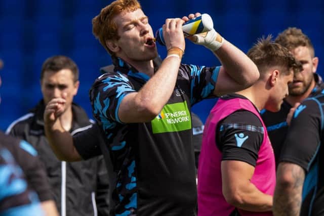 Glasgow Warriors' Rob Harley rehydrates during training for the Pro14 final. Picture: SNS