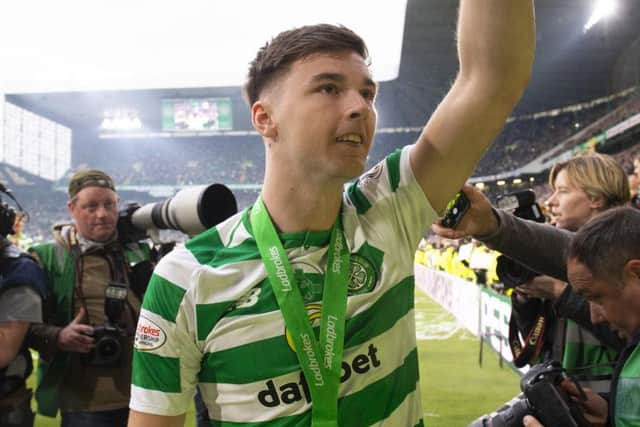 Kieran Tierney celebrates after Celtic's final league game of the season. Pic: SNS