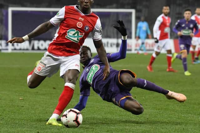Sheyi Ojo in action for Stade Reims against Toulouse in a Ligue 1 clash