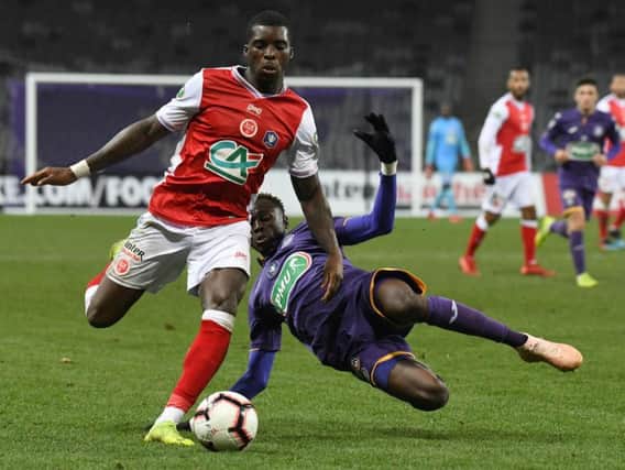 Sheyi Ojo in action for Stade Reims against Toulouse in a Ligue 1 clash