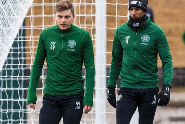 Scott Sinclair takes part in a training session at Celtic's Lennoxtown base alongside fellow winger James Forrest