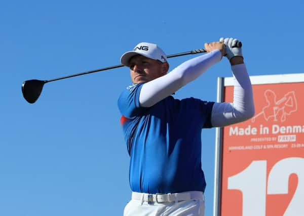 Matt Wallace tees off at the 12th on his way to  carding a four-under par 67 in the first round of the Made in Denmark tournament. Picture: Getty.