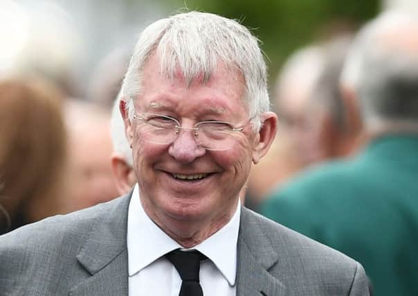 Sir Alex Ferguson saw Hearts lift three cups. Picture: John Devlin