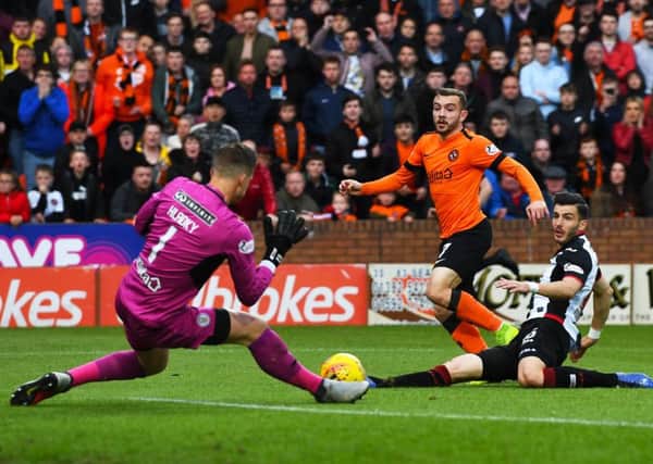 Dundee United's Paul McMullan watches his first-half shot saved by Vaclav Hladky in last night's Premiership play-off final first leg. Picture: SNS