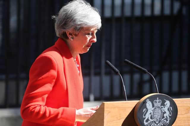 A tearful Theresa May announces her plans to resign. Picture; PA