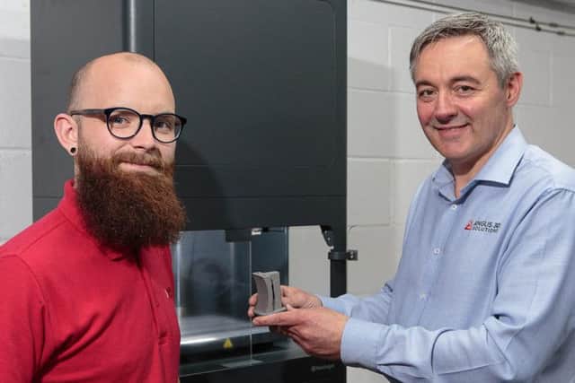 Andy Simpson (right) trains John MacLeod on Angus 3Ds Markforged Metal-X  the first commercially-available in the UK. Picture: ASM Media & PR