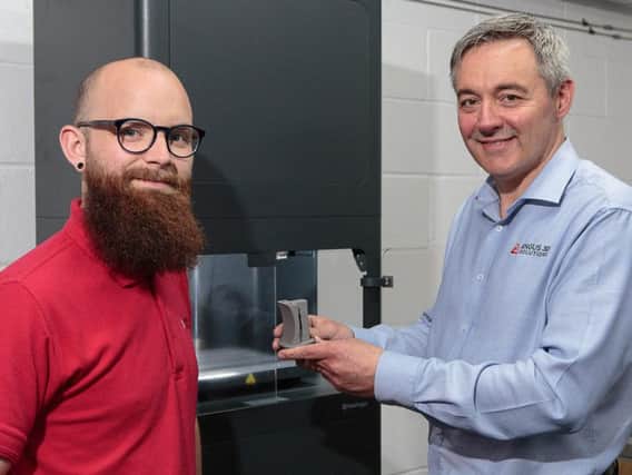 Andy Simpson (right) trains John MacLeod on Angus 3Ds Markforged Metal-X  the first commercially-available in the UK. Picture: ASM Media & PR