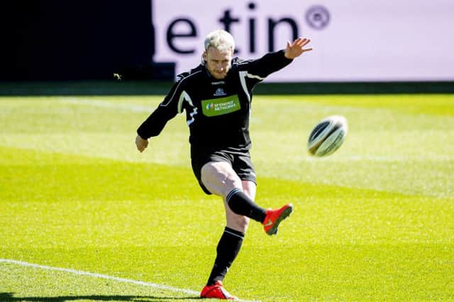 Glasgow full-back Stuart Hogg practises his kicking as he familiarises himself with the Celtic Park pitch. Picture: SNS