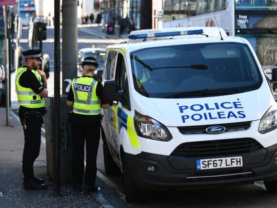 Police attend a crime scene in Glasgow