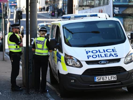 Police attend a crime scene in Glasgow
