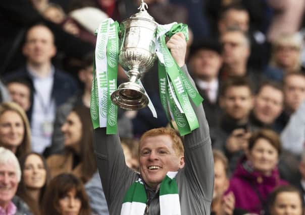 Celtic Manager Neil Lennon lifts the Scottish Cup. Pic: SNS/Craig Foy