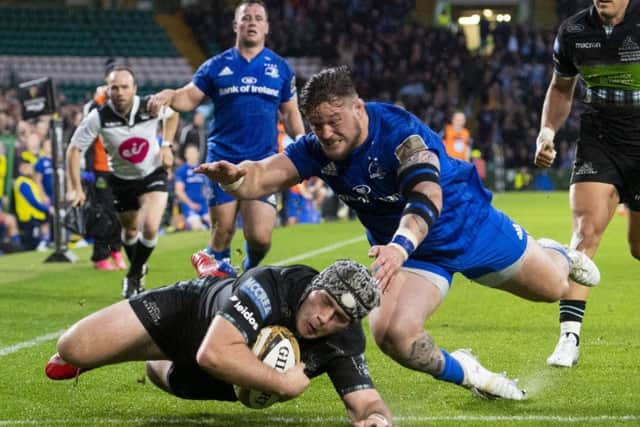 Glasgow Warriors' Grant Stewart goes over to score a try at Celtic Park. Pic: SNS/SRU/Gary Hutchison