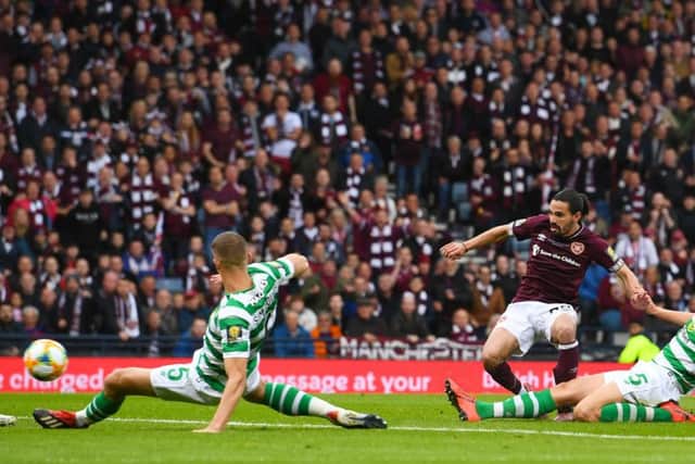Ryan Edwards fires Hearts ahead in the second half but the goal wasn't enough to stop Celtic's treble-treble. Picture: SNS