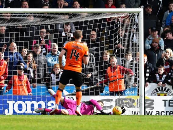 Pavol Safranko sees his penalty saved by St Mirren goalkeeper Vaclav Hladky.
