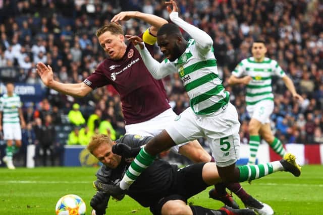 Odsonne Edouard is fouled in the box by Hearts goalkeeper Zdenek Zlamal, winning and then converting the penalty that drew Celtic level. Picture: Craig Foy/SNS