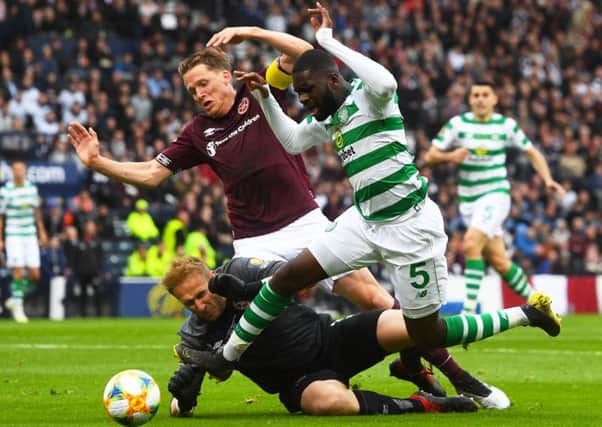Odsonne Edouard is fouled in the box by Hearts goalkeeper Zdenek Zlamal, winning and then converting the penalty that drew Celtic level. Picture: Craig Foy/SNS
