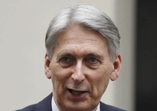 Britain's Chancellor of the Exchequer Philip Hammond. Picture: AP Photo/Alastair Grant
