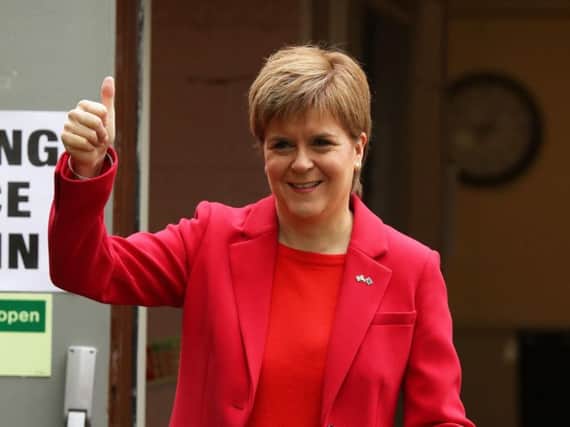 First Minister Nicola Sturgeon attends a polling place for the EU elections
