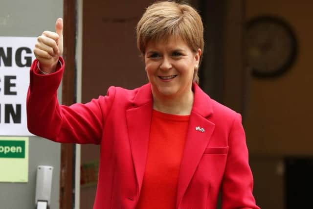 First Minister Nicola Sturgeon attends a polling place for the EU elections