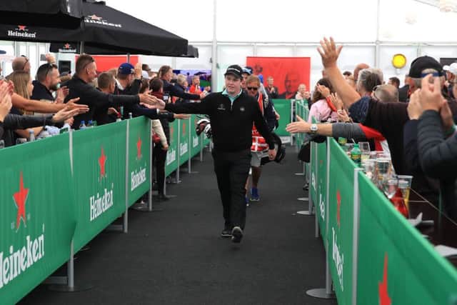 Bob Macintyre responds to fans as they line up to congratulate him on his performance in Denmark. Picture: Getty.