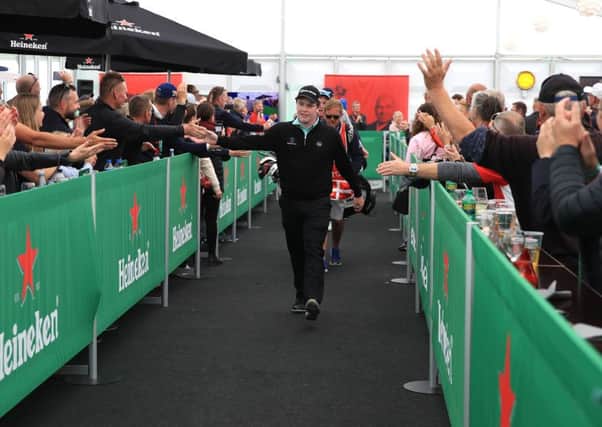 Bob Macintyre responds to fans as they line up to congratulate him on his performance in Denmark. Picture: Getty.