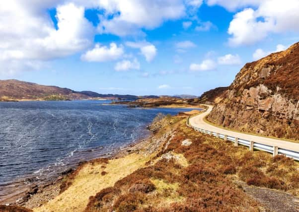 Highway A837 along Loch Assynt in the scottish highlands near Ardvreck Castle