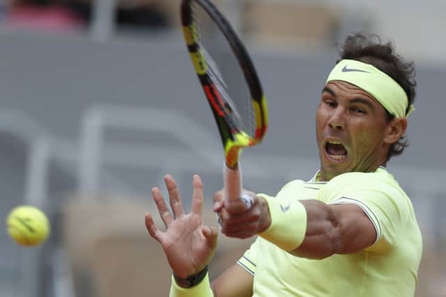 Rafael Nadal thumps a forehand return on his way to a straight-sets win over Yannick Hanfmann at Roland Garros. Picture: Pavel Golovkin/AP