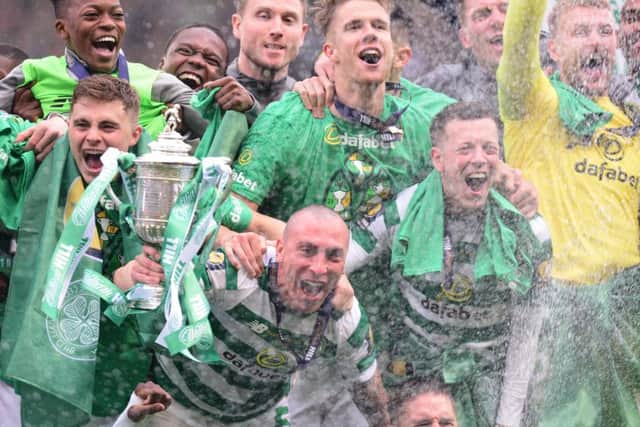 Celtic players celebrate the Scottish Cup final win over Hearts. Picture: Mark Runnacles/Getty Images