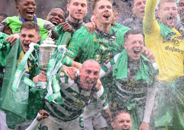 Celtic players celebrate the Scottish Cup final win over Hearts. Picture: Mark Runnacles/Getty Images