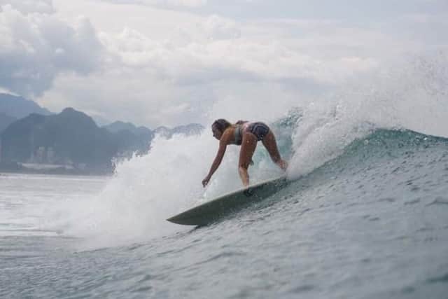 McLachlan surfing in Sumatra. She and her partner Finn MacDonald have surfed some of the best waves in the world, from Sri Lanka to New Zealand, but they still decided to return home to Scotland to set up a surf school. PIC: Muhibbus Sabri