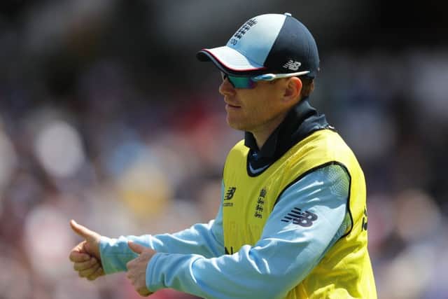Thumbs up from Eoin Morgan as he watches his side thrash Afghanistan in their final warm-up game. Picture: Richard Heathcote/Getty