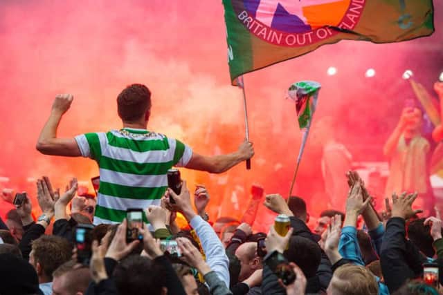 Celtic fans gather to watch the bus parade - only for it to be rerouted.