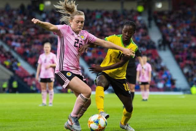 In her first-ever football match, Laura Waddell found herself at home among a record crowd watching Scotlands Erin Cuthbert, Jamaicas Jody Brown and others in action (Picture: Paul Devlin/SNS Group)