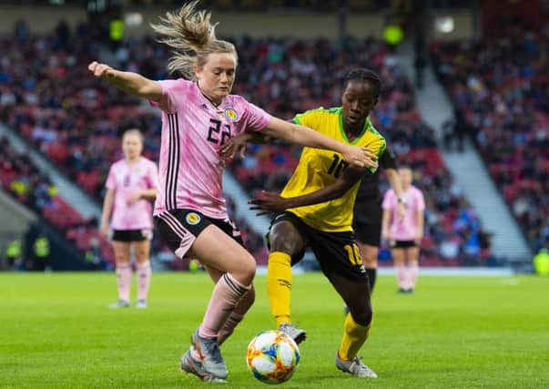 In her first-ever football match, Laura Waddell found herself at home among a record crowd watching Scotlands Erin Cuthbert, Jamaicas Jody Brown and others in action (Picture: Paul Devlin/SNS Group)