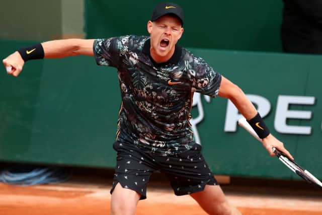Kyle Edmund celebrates after completing his 7-6, 5-7, 6-4, 4-6, 7-5 first-round victory over Fenchman Jeremy Chardy yesterday. Picture: Getty