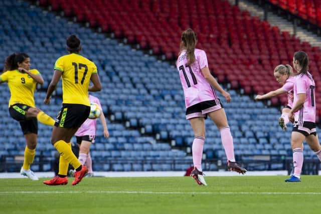 Erin Cuthbert equalises for Scotland with a superb shot from outside the penalty area. Picture: SNS.