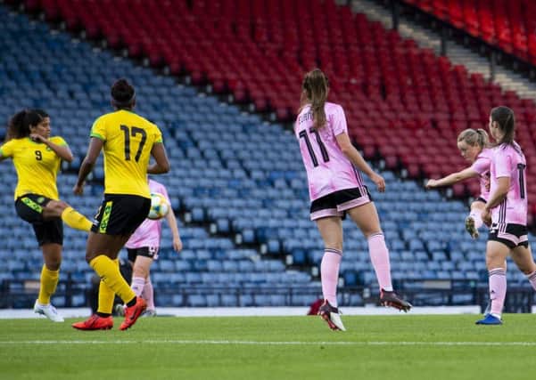 Erin Cuthbert equalises for Scotland with  a superb shot from outside the penalty area. Picture: SNS.