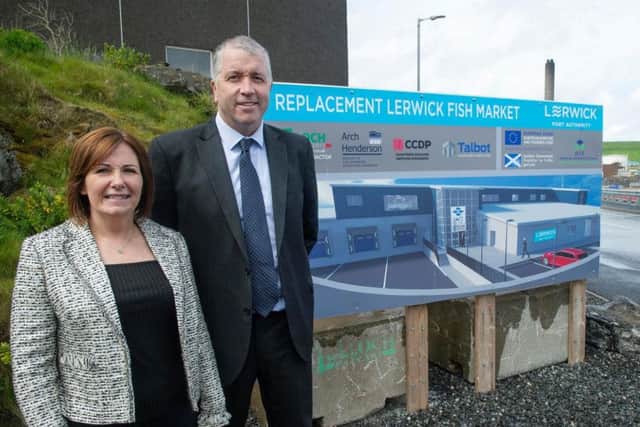 Carolyn Martin, relationship manager at Bank of Scotland, with Calum Grains chief executive of Lerwick Port Authority. Picture: Contributed