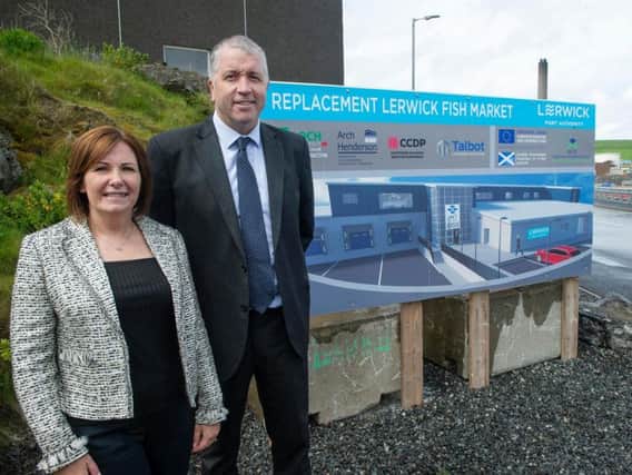 Carolyn Martin, relationship manager at Bank of Scotland, with Calum Grains chief executive of Lerwick Port Authority. Picture: Contributed