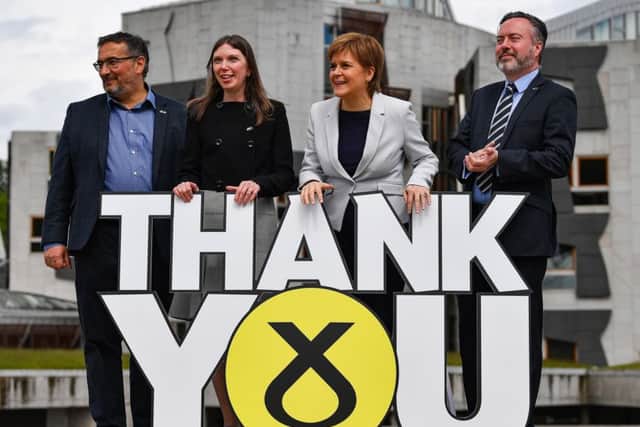 Nicola Sturgeon with three newly elected SNP MEPs Christian Allard, Aileen McLeod and Alyn Smith (Picture: Jeff J Mitchell/Getty Images)