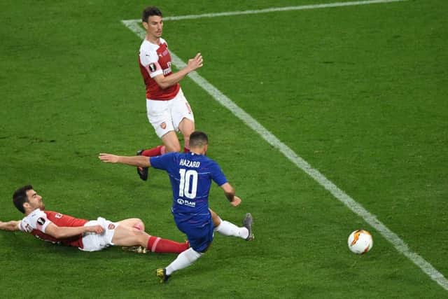 Eden Hazard sweeps home his second and Chelseas fourth goal in what may have been his final game for the London club. Picture: Yuri Kadobnov/AFP/Getty