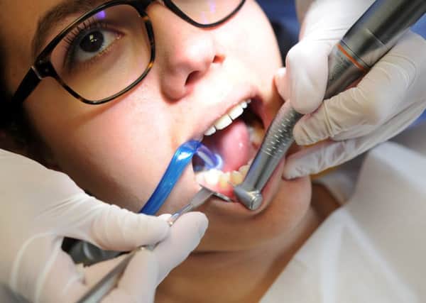 Any changes in how HMRC views the employment status of associates and hygienists could be the employment law equivalent of extraction without painkillers. Picture: AFP