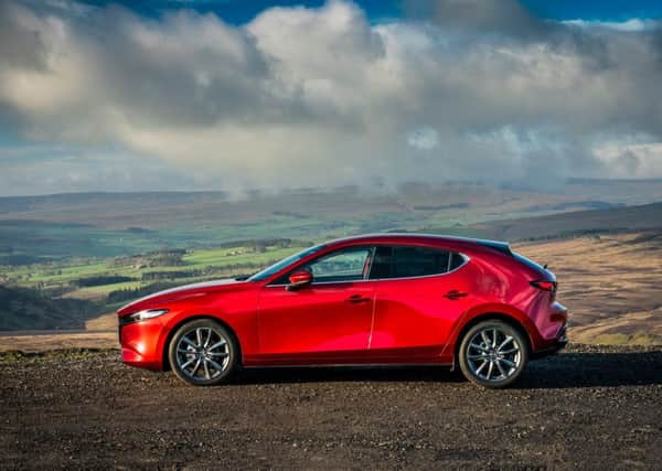 The Mazda3's profile makes it more rakish that its rivals, though you may bump your head more often