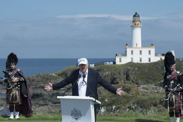 Donald Trump gives a press conference in 2016 at Turnberry's ninth tee, which looks out over the famous lighthouse. Picture: Oli Scarff/AFP/Getty Images
