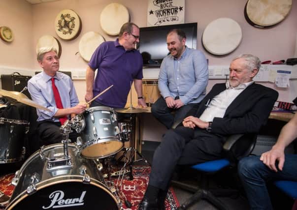 Music buff Richard Leonard with Jeremy Corbyn on a visit to The Playz in Kilwinning during a visit to Scotland by the UK party leader. Picture: John Devlin