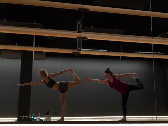 Fiona Armour (right) in one of her yoga classes.