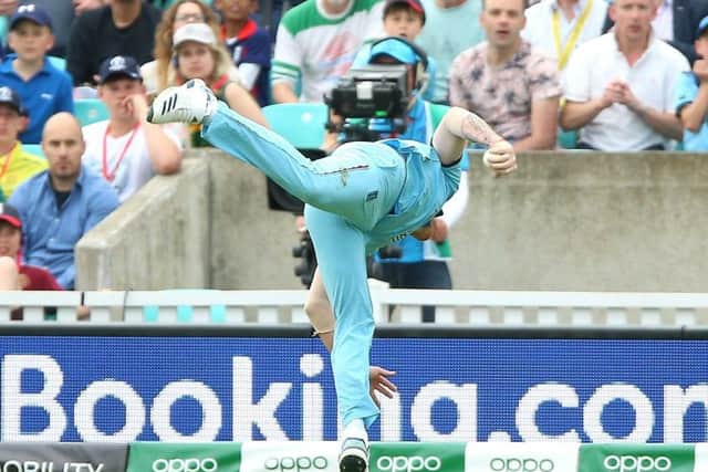 Ben Stokes makes an acrobatic one-handed catch to dismiss South African batsman Andile Phehlukwayo. Picture: PA.