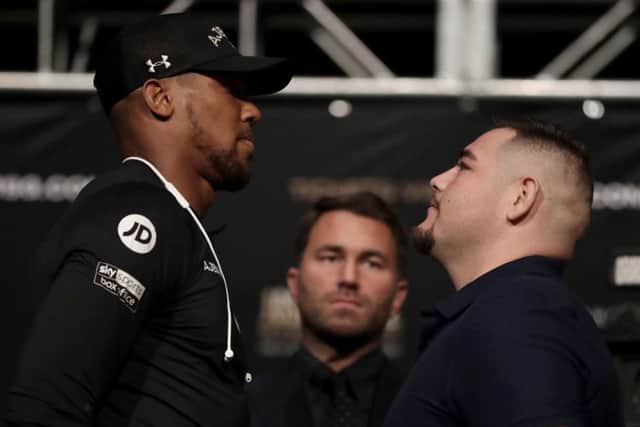 Anthony Joshua, left, faces off against Andy Ruiz Jr before a press conference ahead of their heavyweight showdown at Madison Square Garden. Picture: AP.
